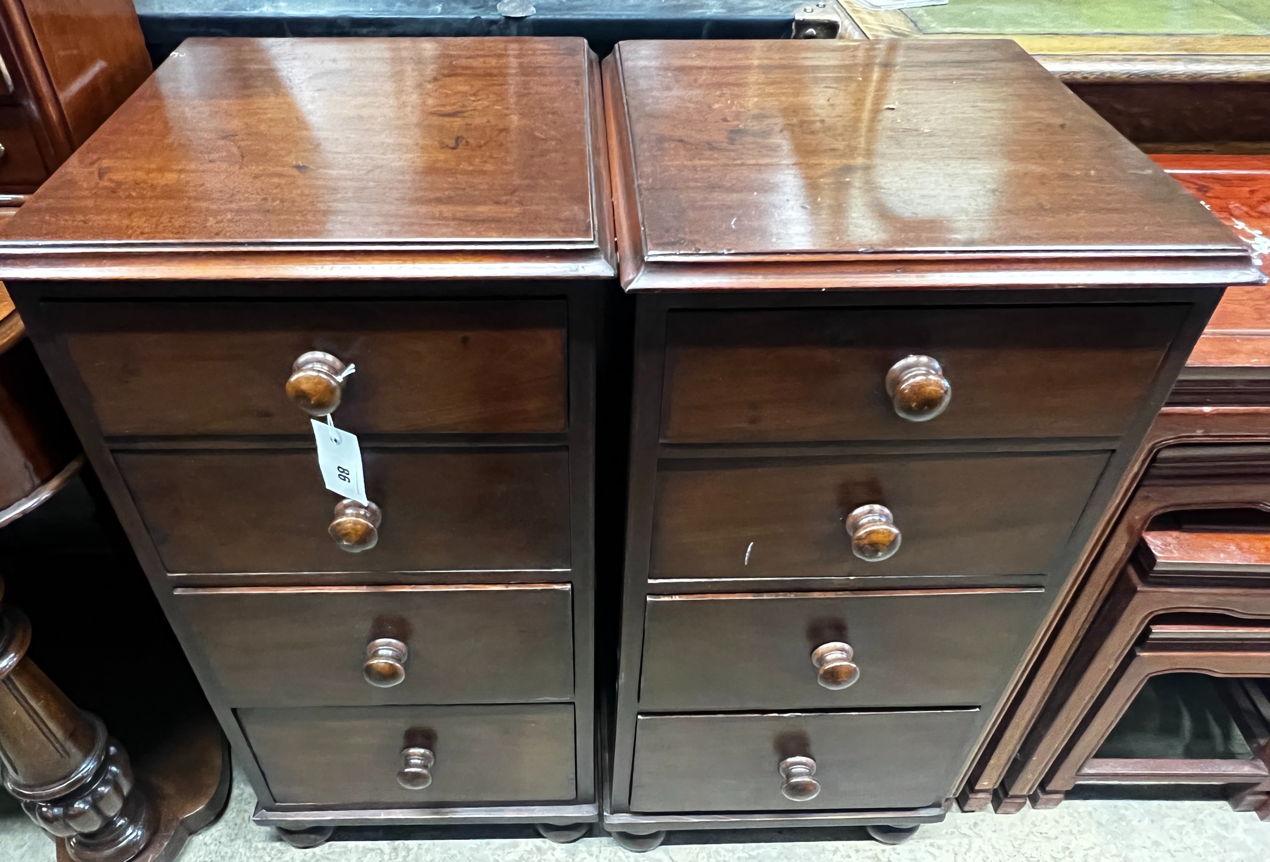 A pair of Victorian mahogany square four drawer bedside chests, (altered), 39cm, height 77cm